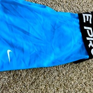 Blue Nike Pro Shorts , Very tight Fitting .